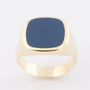 Gold men's ring with blue bearing