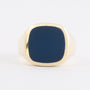 Gold men's ring with blue bearing