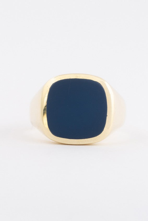 Gold men's ring with blue bearing