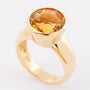 Gold ring with faceted citrine