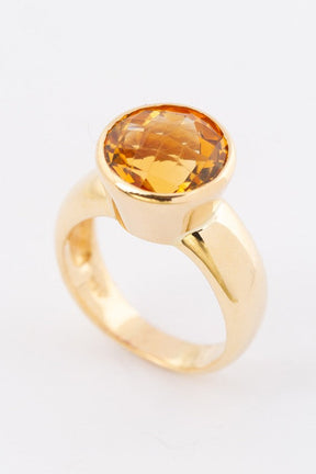 Gold ring with faceted citrine