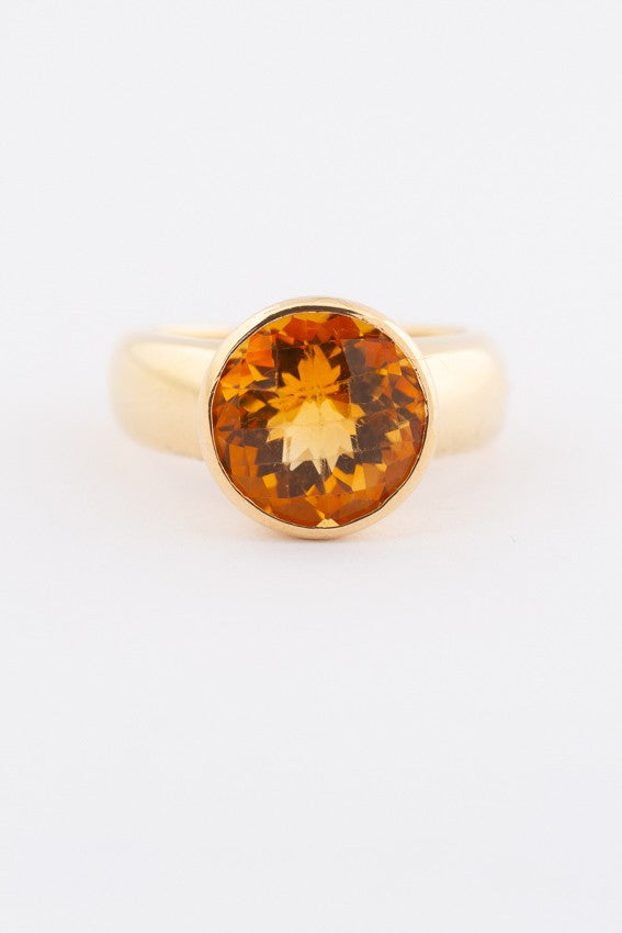 Gold ring with faceted citrine