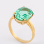 Gold ring with green synthetic corundum