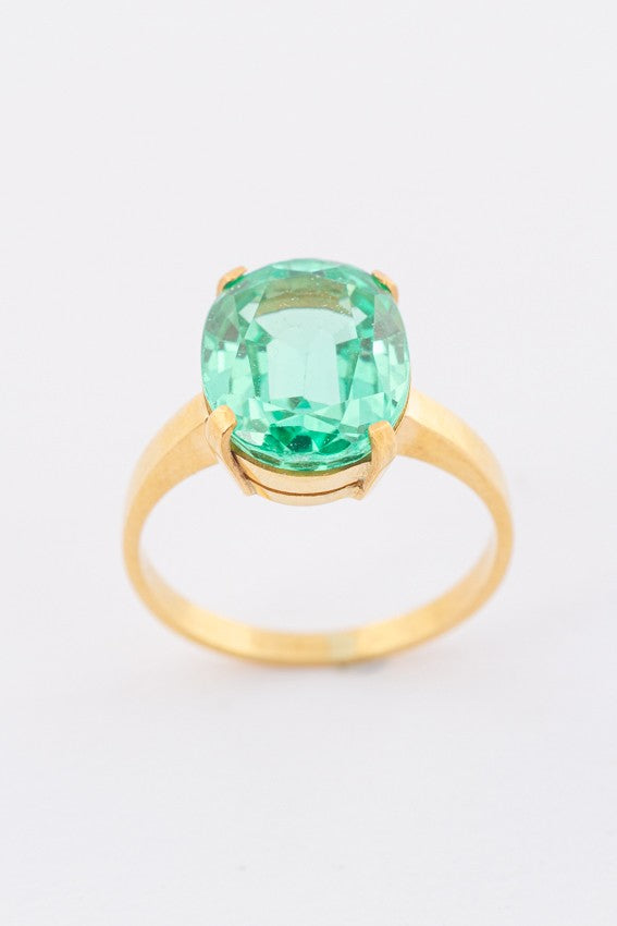 Gold ring with green synthetic corundum