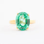 Gold ring with green synthetic corundum