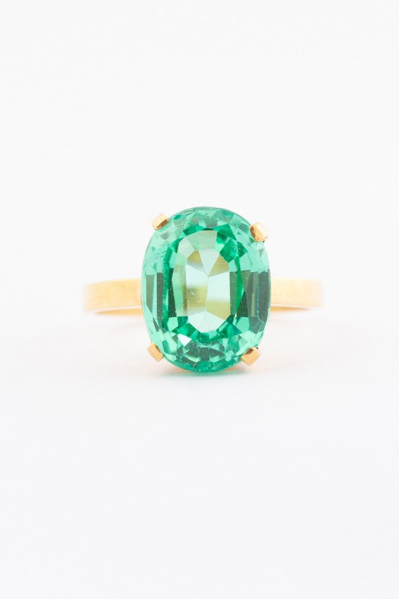 Gold ring with green synthetic corundum