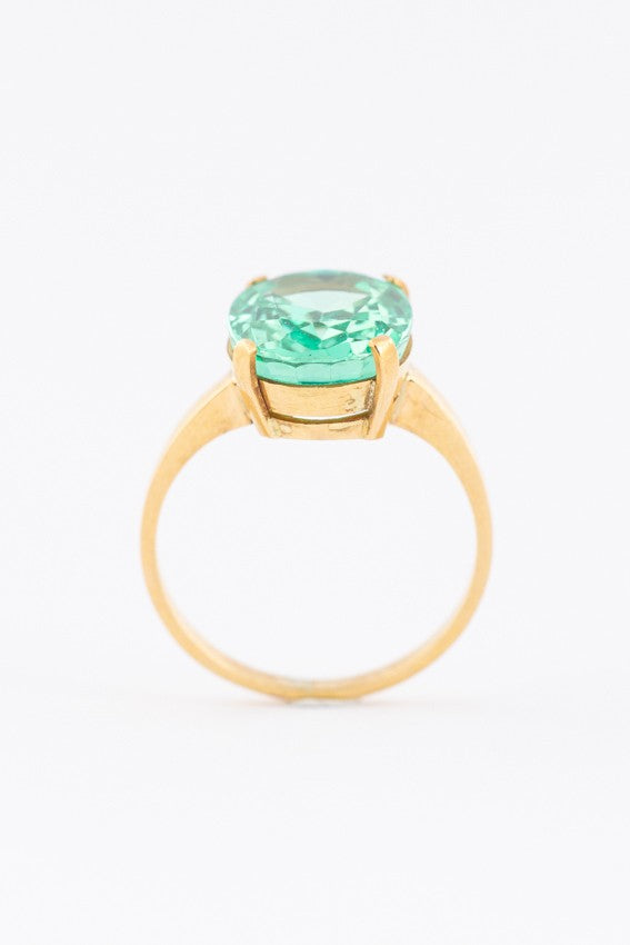 Gold ring with green synthetic corundum