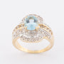 Gold ring with topaz and 48 diamonds