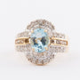 Gold ring with topaz and 48 diamonds