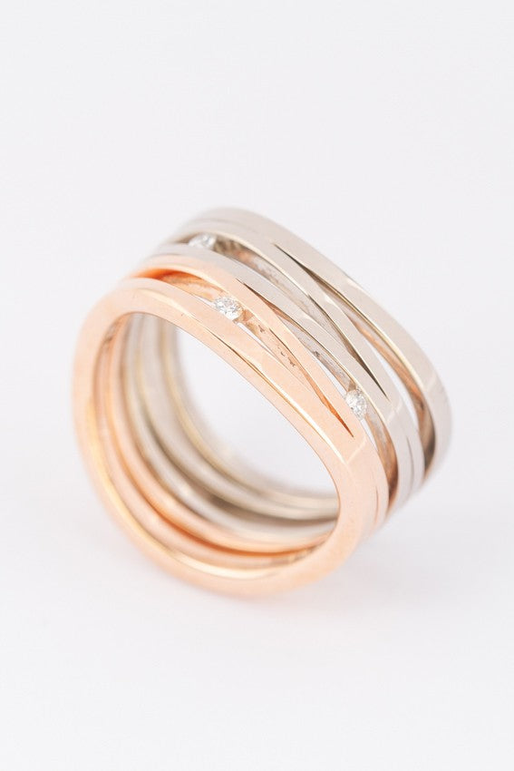 White/rose gold ring with 3 diamonds