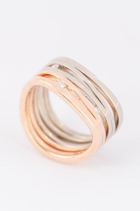 White/rose gold ring with 3 diamonds