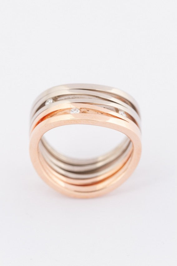 White/rose gold ring with 3 diamonds
