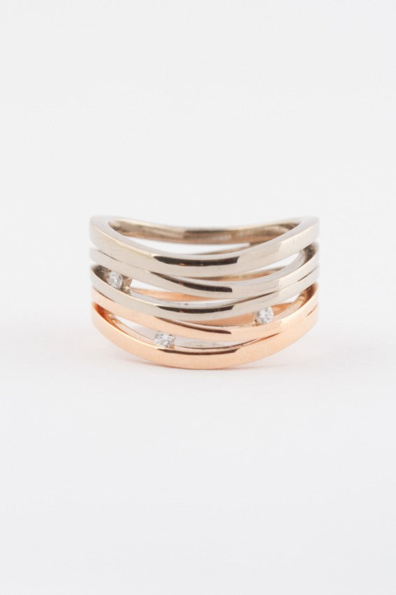 White/rose gold ring with 3 diamonds