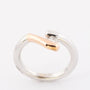 Solid white/rose gold ring with a 0.17 ct brilliant.