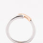 Solid white/rose gold ring with a 0.17 ct brilliant.