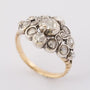 Gold entourage ring with rose-cut diamonds set in silver