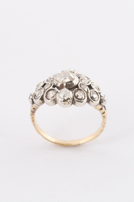 Gold entourage ring with rose-cut diamonds set in silver