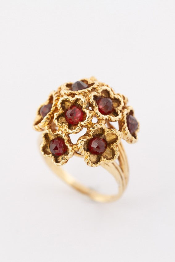 Gold cocktail ring with garnets