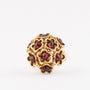 Gold cocktail ring with garnets