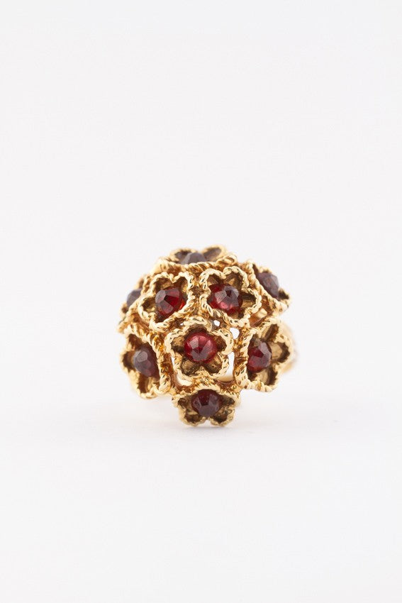 Gold cocktail ring with garnets