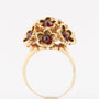 Gold cocktail ring with garnets