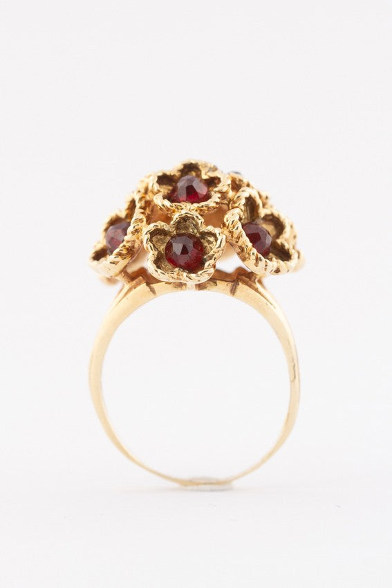 Gold cocktail ring with garnets
