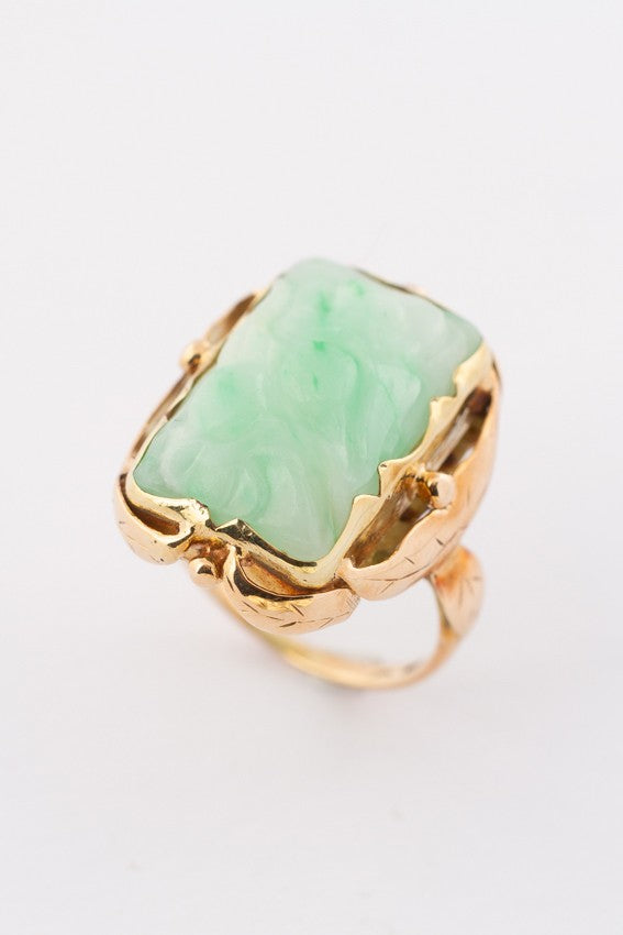 Gold ring with floral cut jade