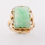 Gold ring with floral cut jade