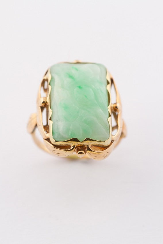 Gold ring with floral cut jade