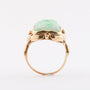 Gold ring with floral cut jade