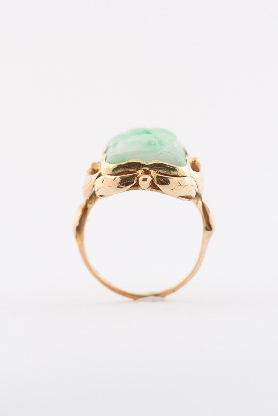 Gold ring with floral cut jade