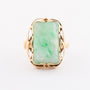 Gold ring with floral cut jade