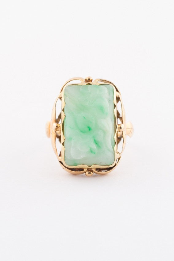 Gold ring with floral cut jade