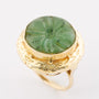 Gold ring with nephrite (jade)