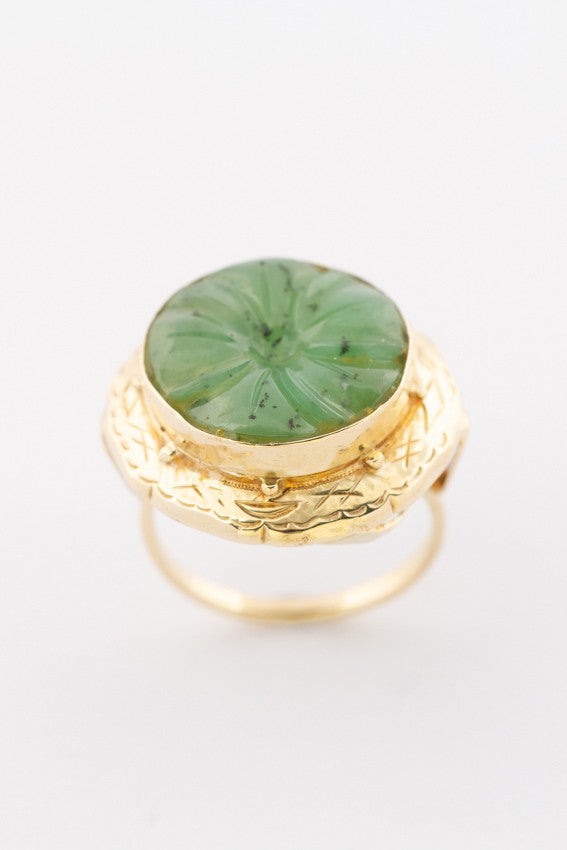 Gold ring with nephrite (jade)