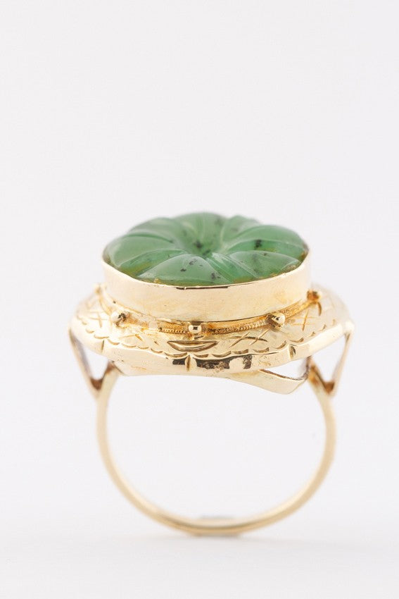 Gold ring with nephrite (jade)