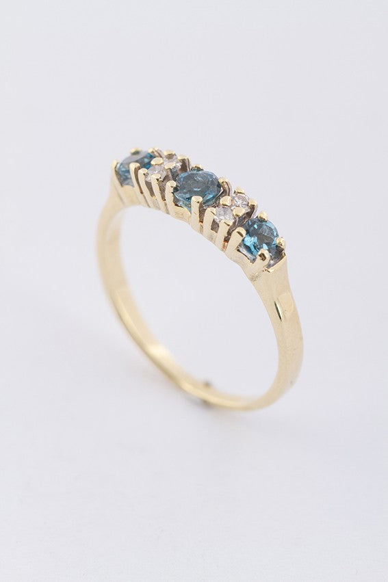 Gouden ring met 3 topazen en 4 diamanten (8-kant)