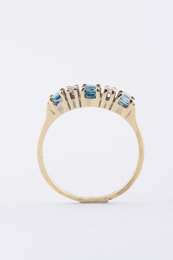 Gouden ring met 3 topazen en 4 diamanten (8-kant)