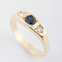 Gold ring with sapphire and brilliant