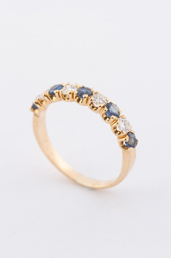 Gouden rij ring met 5 saffieren en 4 briljanten