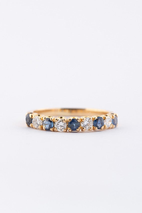 Gouden rij ring met 5 saffieren en 4 briljanten