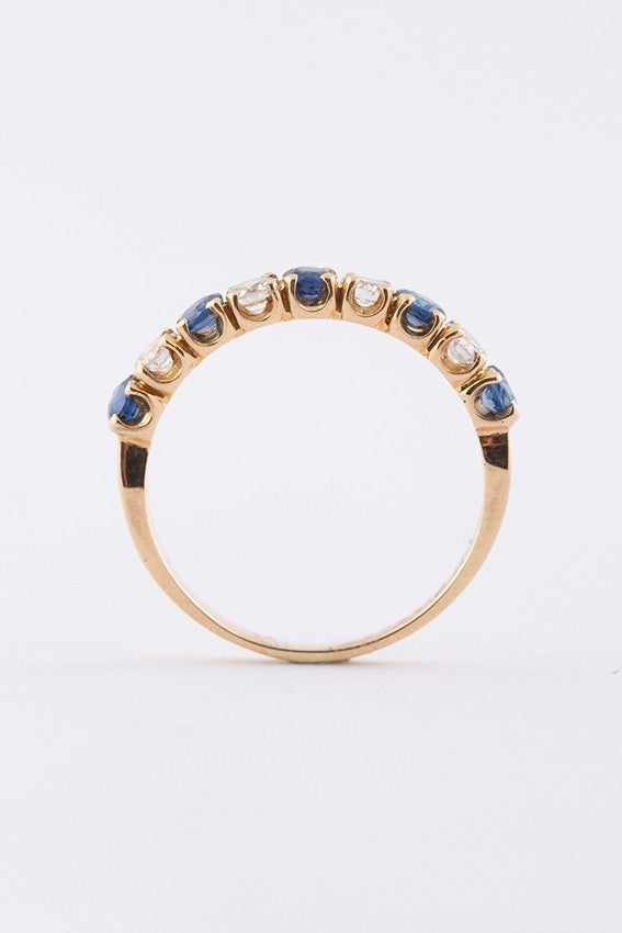 Gouden rij ring met 5 saffieren en 4 briljanten