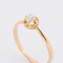 Gold solitaire ring with an old-cut brilliant of approx. 0.20 ct.