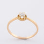 Gold solitaire ring with an old-cut brilliant of approx. 0.20 ct.