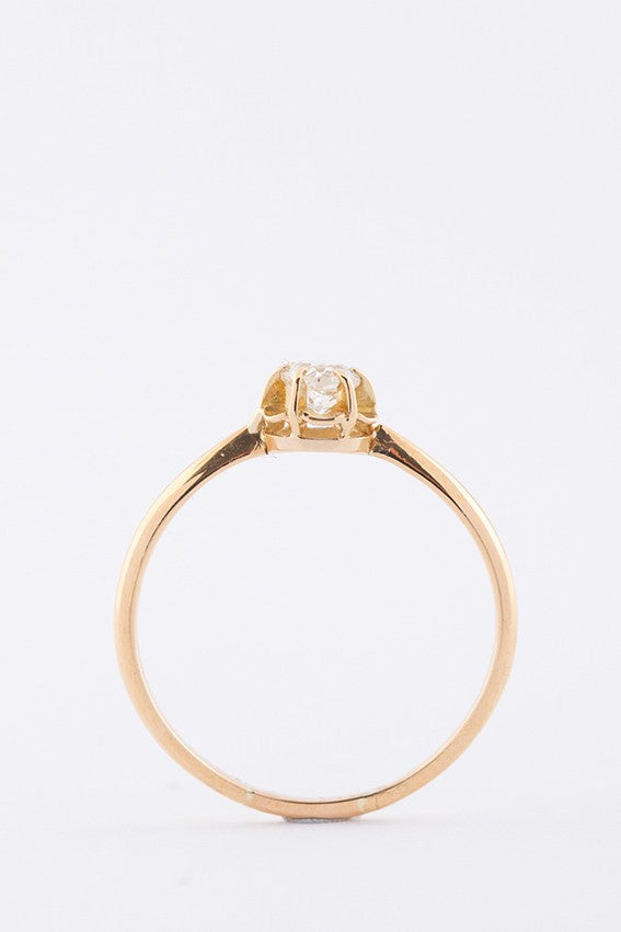 Gold solitaire ring with an old-cut brilliant of approx. 0.20 ct.