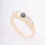 Gold English row ring with 4 brilliants and a sapphire