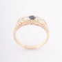 Gold English row ring with 4 brilliants and a sapphire