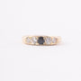 Gold English row ring with 4 brilliants and a sapphire