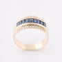 Gold ring with baguette-cut sapphires and 24 brilliant-cut diamonds