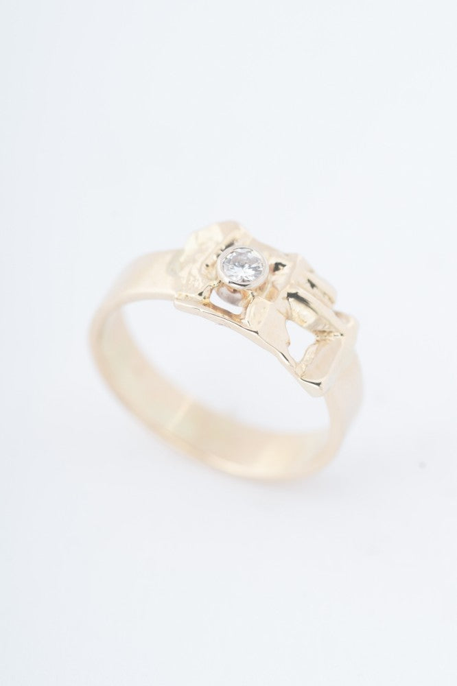 Gold ring with a brilliant cut diamond with Master Mark P. vd Hout